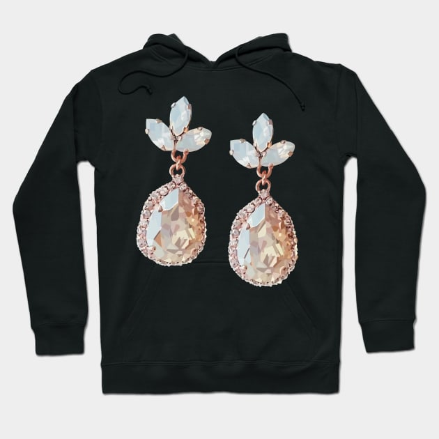 Rose-gold costume jewellery earrings with nude crystals and moon stones. Hoodie by Tana B 